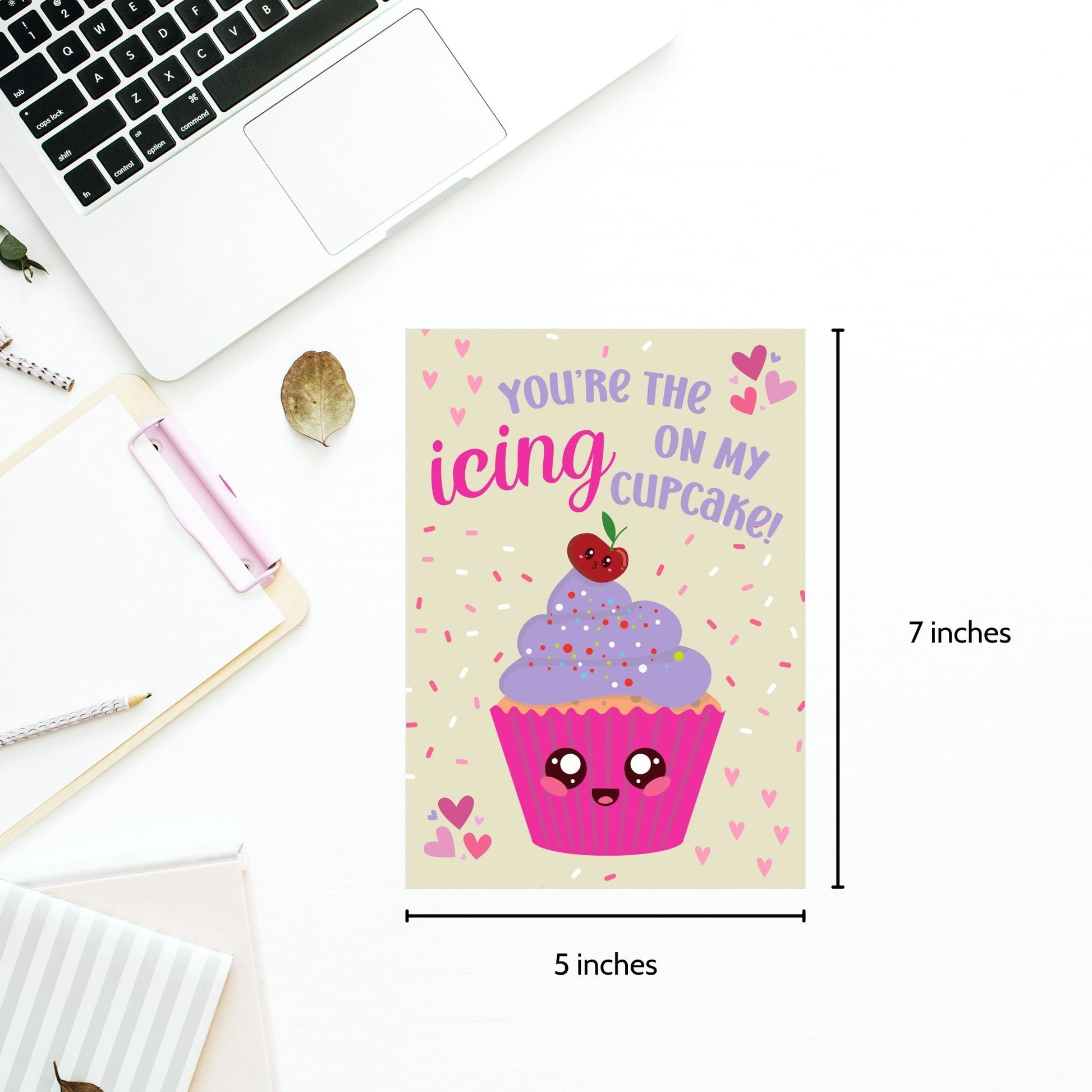 Printable Valentine’s Day card featuring the phrase “You’re the Icing on My Cupcake” with a cute cupcake design. Designed as a 5x7 PDF on an 8.5 x 11 sheet with two cards per page. A punny and sweet Valentine’s card for loved ones.