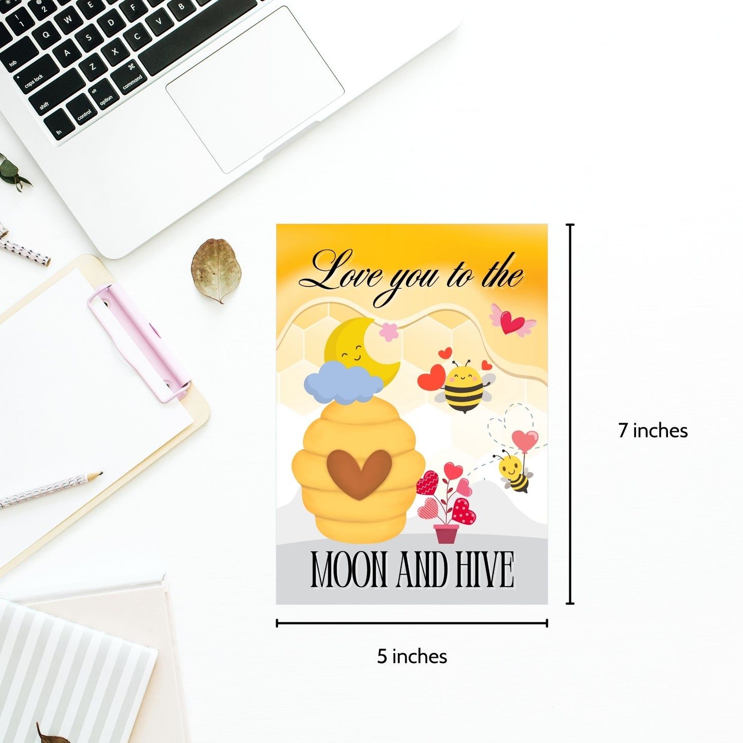 Printable Valentine’s Day card featuring the phrase “Love You to the Moon and Hive” with a bee and moon design. Designed as a 5x7 PDF on an 8.5 x 11 sheet with two cards per page. A punny and heartfelt Valentine’s card for loved ones.