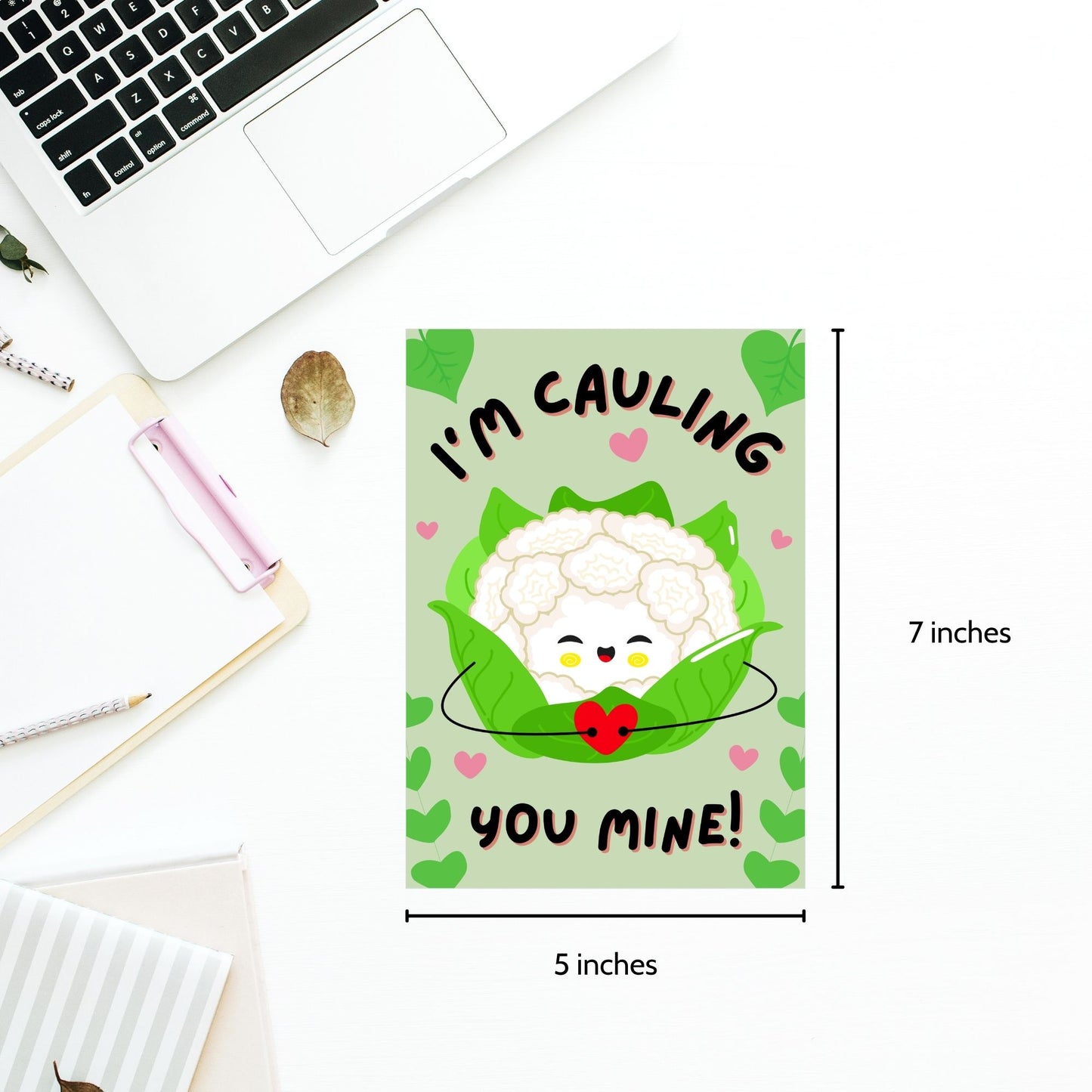 Printable Valentine’s Day Greeting Card featuring the phrase “I’m Cauling You Mine” with a cute cauliflower design. Designed as a 5x7 PDF on an 8.5 x 11 sheet with two cards per page. A fun and punny Valentine’s card for loved ones.