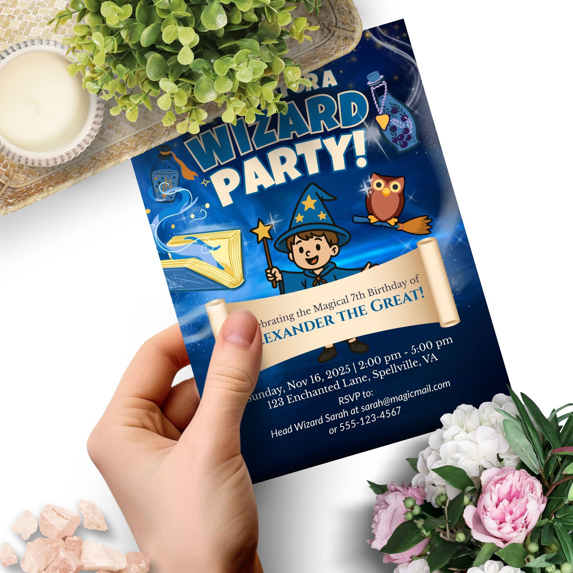 Wizard-themed invitation template featuring a boy wizard with wand, spell book, flying owl, and magical background. Includes editable party details on a scroll banner.