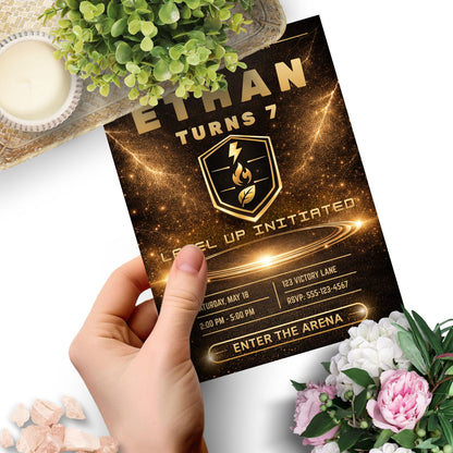 Editable luxury black and gold monster trainer inspired birthday invitation with glowing arena, elite badge, and customizable party details in Canva