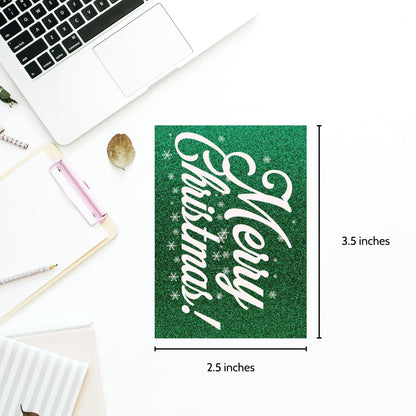 A set of green and white Christmas gift tags featuring "Merry Christmas!" in elegant white script on a glittering green background adorned with snowflake accents. Perfect for festive gift wrapping.