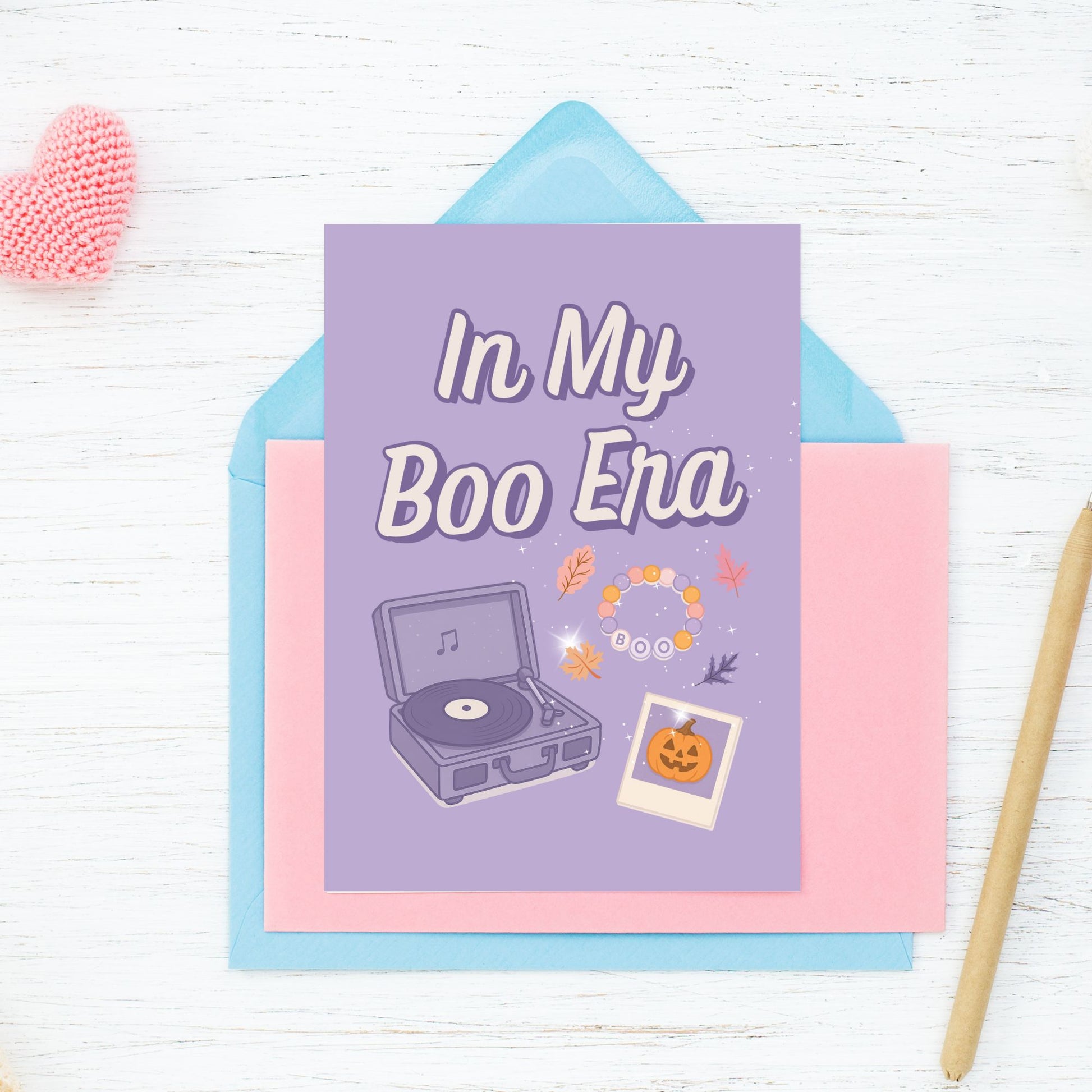Greeting card with 'In My Boo Era' text and record player illustration on a colorful envelope.