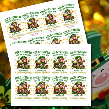 Festive leprechaun-themed holiday gift tags featuring a cheerful elf in a green outfit, surrounded by golden coins, presents, and candy canes. The tag reads 'Luck and Cheer are on Their Way - Wishing You a Golden Holiday!'