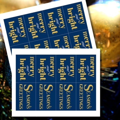 A set of ready-to-print Christmas gift tags featuring shimmering gold glitter text on a royal blue background with festive messages like "Merry and Bright" and "Season's Greetings." Each tag is sized at 2.5 x 3.5 inches, ideal for adding a luxurious touch to holiday gifting.