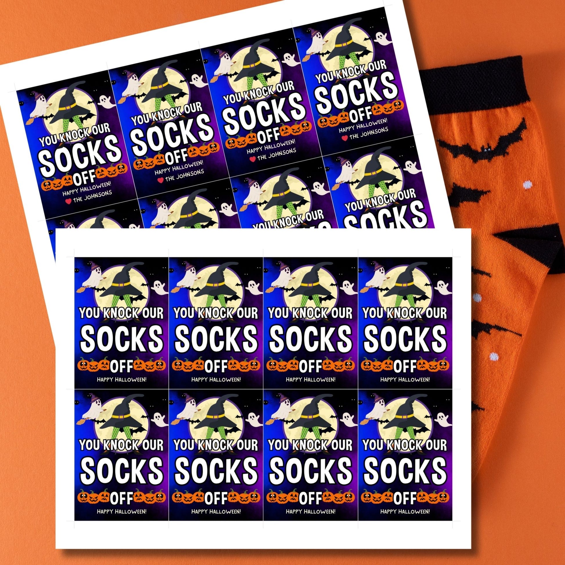 Halloween-themed printable gift tags with the message "You Knock Our Socks Off!" featuring a witch's hat, spooky ghosts, and jack-o'-lanterns, perfect for sock gifts. Tags are 2.5 x 3.5 inches, laid out 8 per sheet on a standard 8.5 x 11-inch page. Includes a printable PDF and a PDF with a link to an editable Canva template.