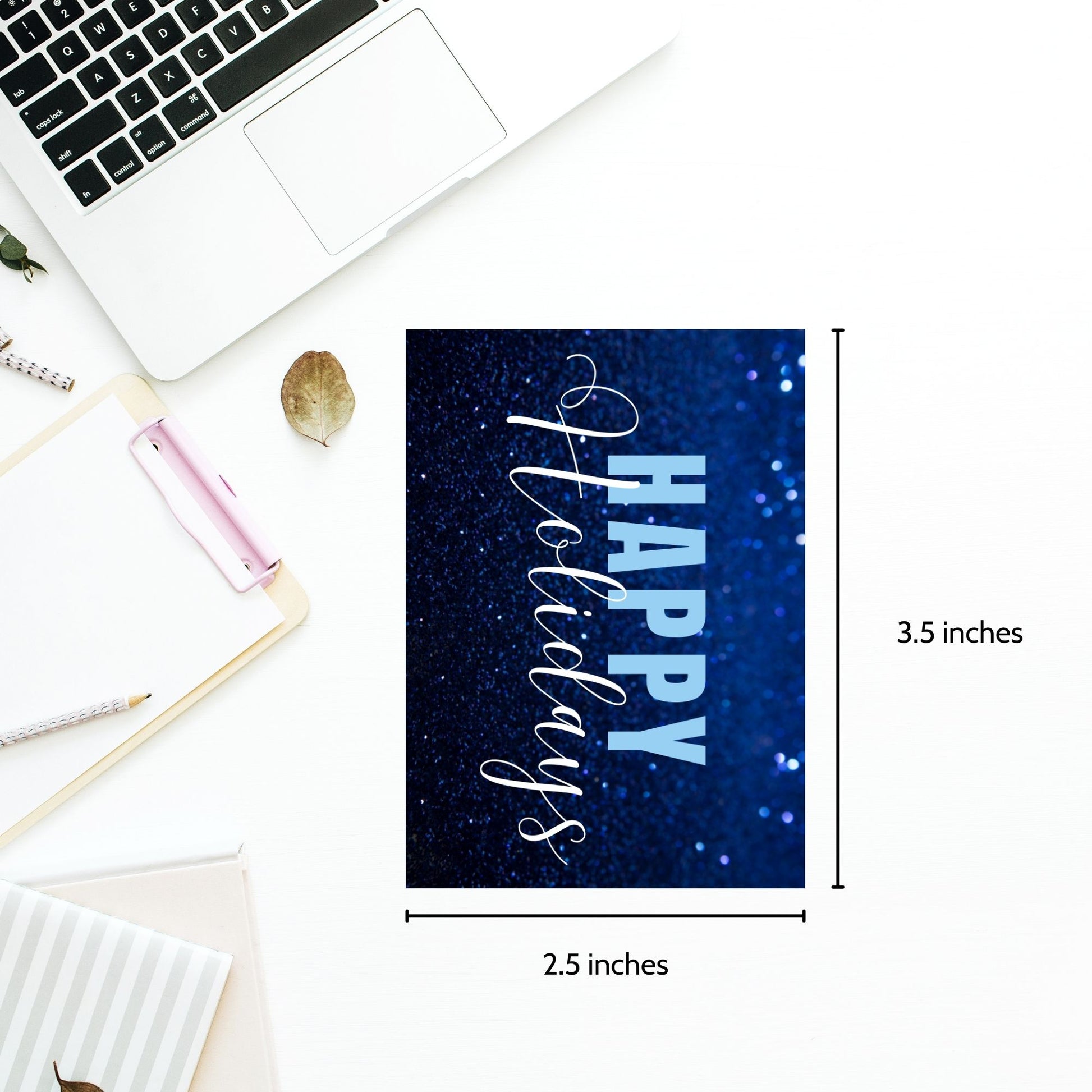 Printable blue Holiday gift tags with a glittery blue background and bold light blue "Happy Holidays" text, sized 2.5 x 3.5 inches, 8 tags per sheet.