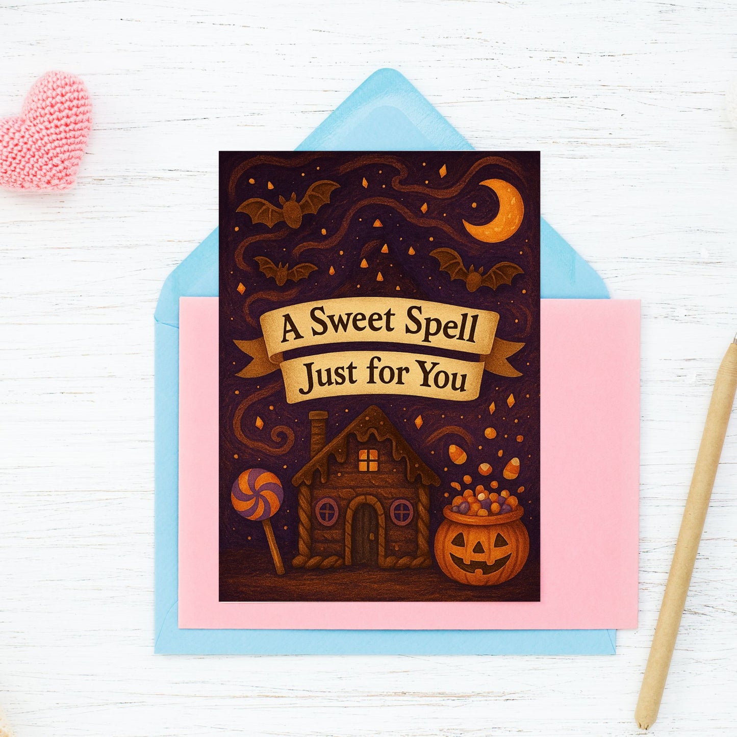 Halloween-themed card with a house, pumpkins, and bats on a white background