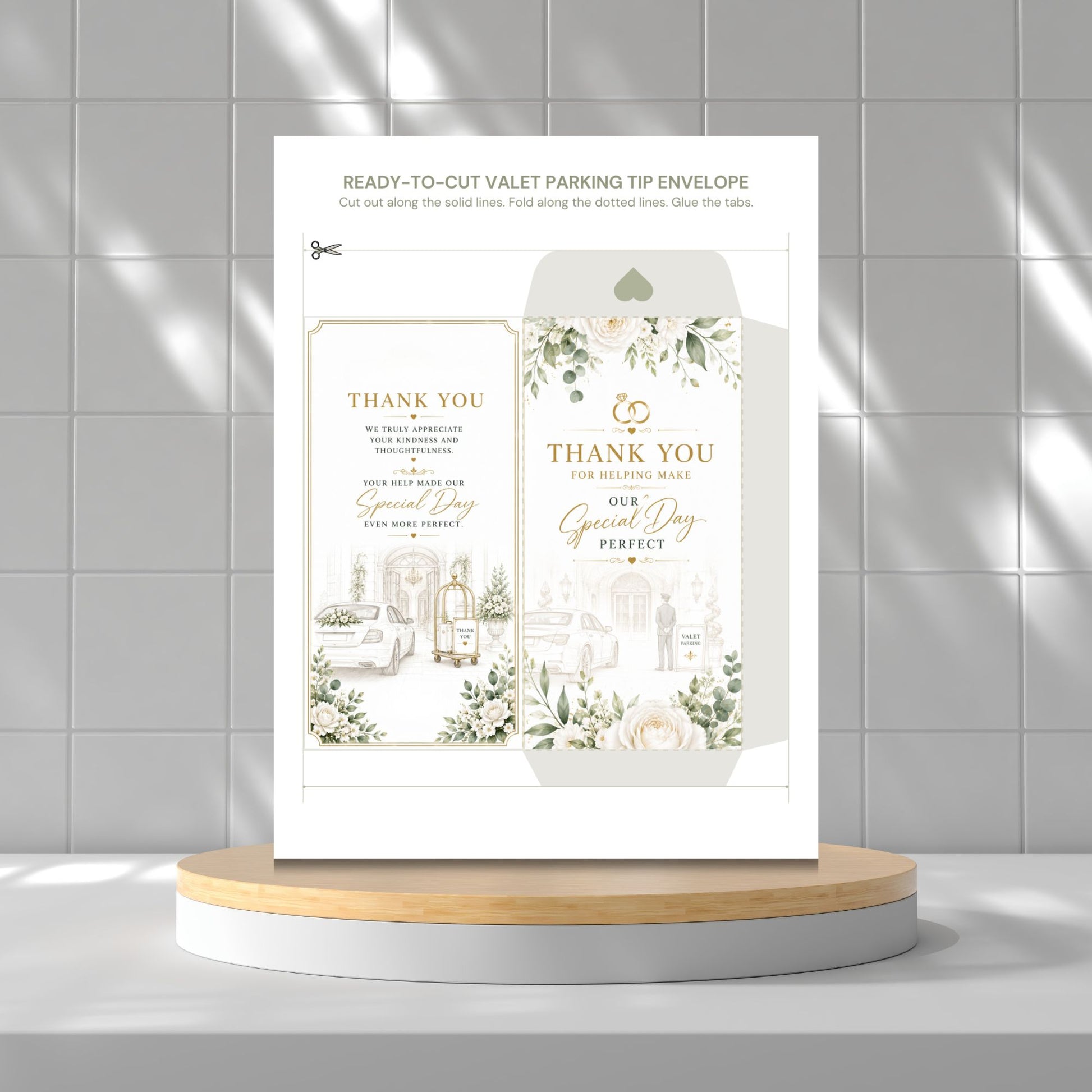 A printed valet parking tip envelope card set displayed upright on a round wooden-and-white pedestal against a light gray tiled wall. The card shows floral illustrations and elegant text reading 'THANK YOU' and 'Special Day Perfect.