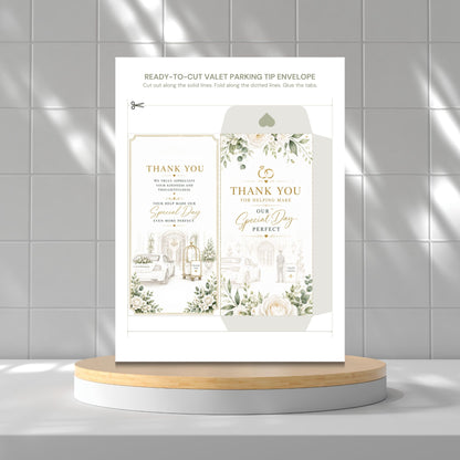 A printed valet parking tip envelope card set displayed upright on a round wooden-and-white pedestal against a light gray tiled wall. The card shows floral illustrations and elegant text reading 'THANK YOU' and 'Special Day Perfect.