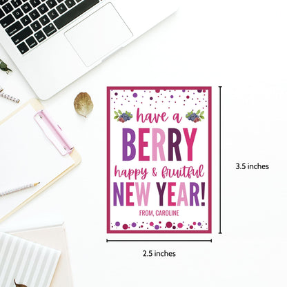 Berry-themed editable New Year gift tags with the message “Have a Berry Happy & Fruitful New Year!” laid out on an 8.5 x 11-inch sheet with 8 tags in vibrant berry colors.