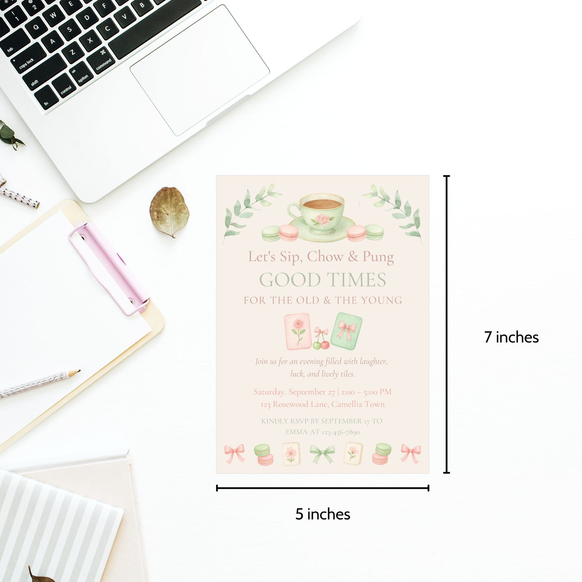 Card with decorative elements on a desk with measurements indicated