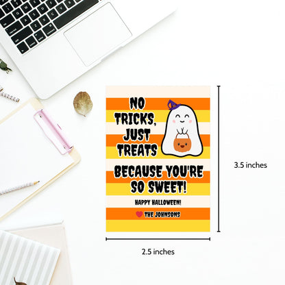 Halloween-themed printable gift tags featuring a cute ghost holding a pumpkin with the message "No Tricks, Just Treats Because You're So Sweet!" Tags are 2.5 x 3.5 inches, laid out 8 per sheet on a standard 8.5 x 11-inch page. Includes a printable PDF and a PDF with a link to an editable Canva template.