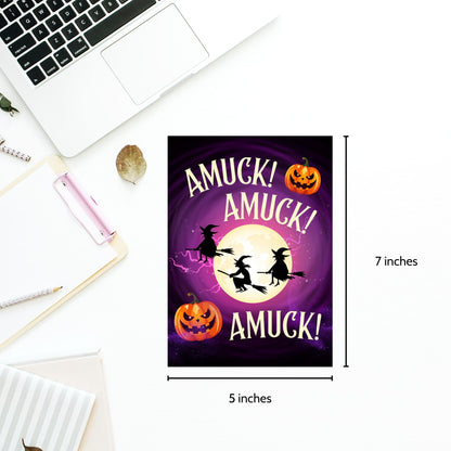 Halloween-themed poster with witches and pumpkins on a purple background, displayed next to a laptop.