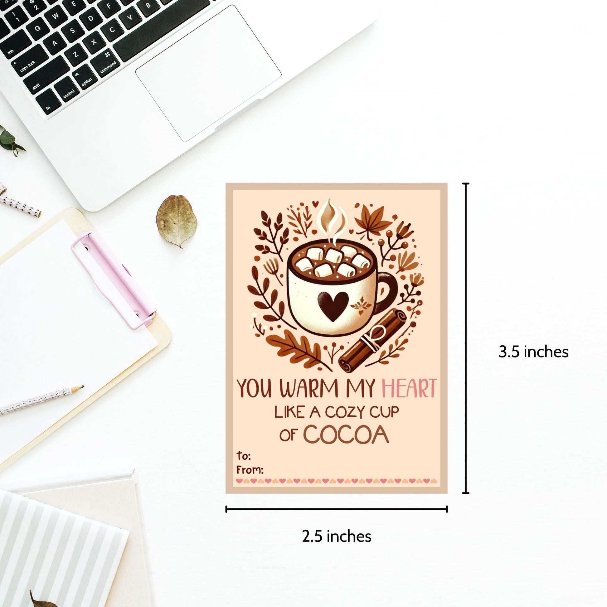 Editable hot cocoa-themed fall gift tags with the message 'You Warm My Heart Like a Cozy Cup of Cocoa' in 2.5 x 3.5 inches, 8 per sheet, available as printable and customizable PDFs.