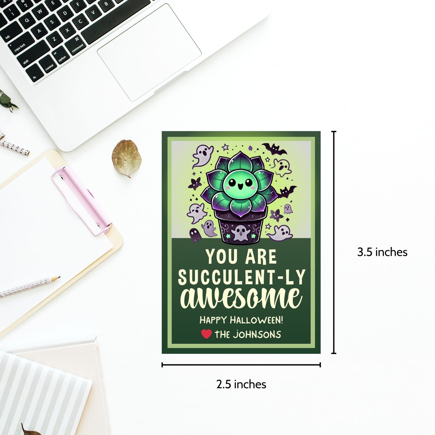 Halloween-themed printable gift tags with the message "You Are Succulent-ly Awesome" featuring a cute succulent plant surrounded by spooky Halloween icons. Tags are 2.5 x 3.5 inches, laid out 8 per sheet on a standard 8.5 x 11-inch page. Includes a printable PDF and a PDF with a link to an editable Canva template.