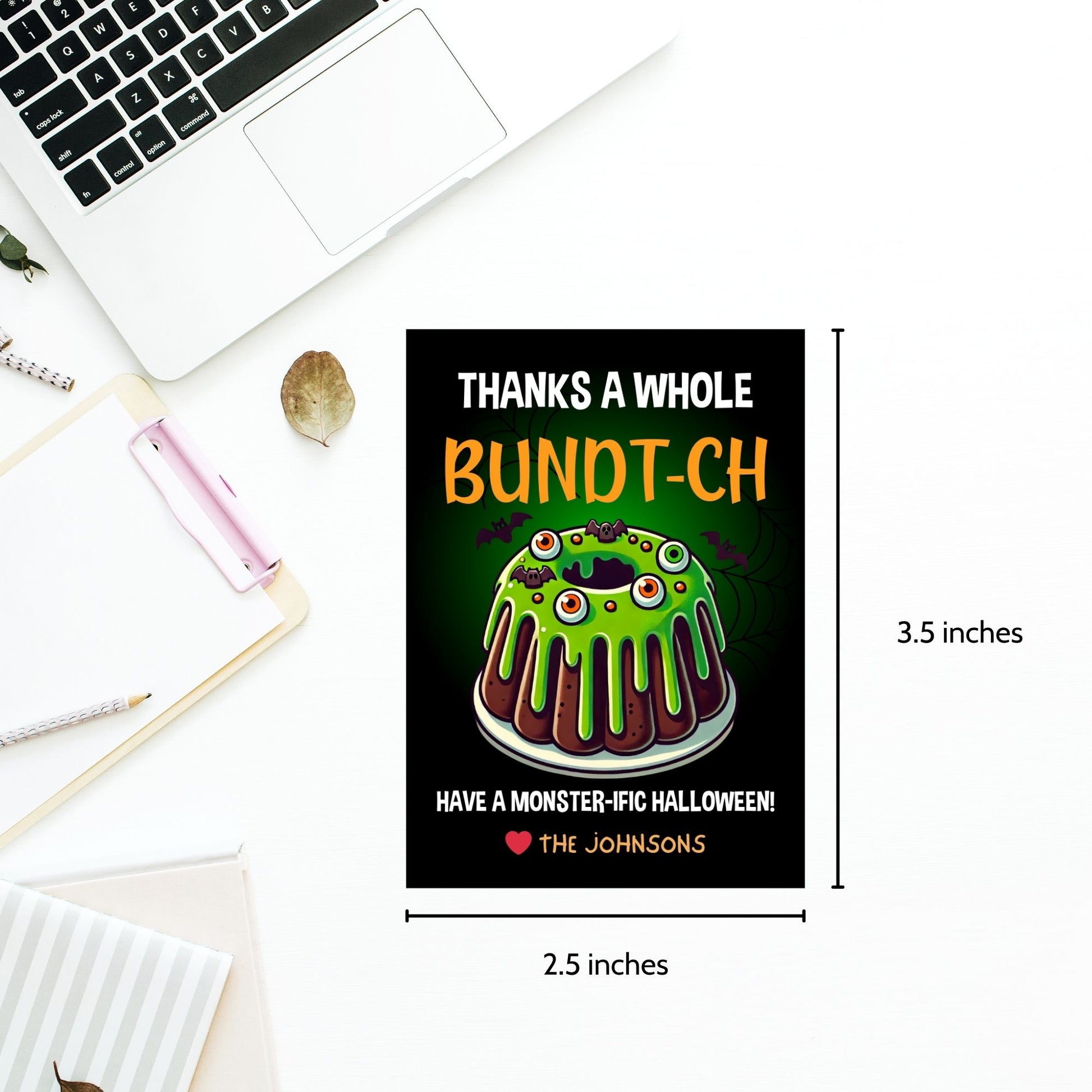 Halloween gift tag featuring a monster-themed bundt cake with green icing, creepy eyeballs, and the message 'Thanks a Whole Bundt-Ch. Have a Monster-ific Halloween!'