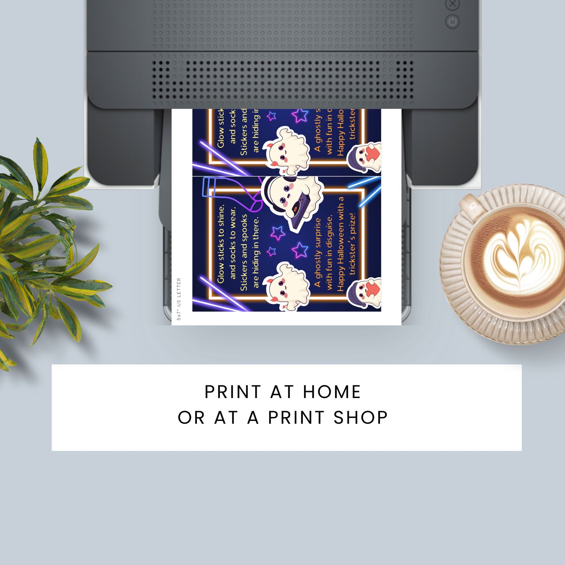 Printer with a printed sheet featuring cartoon characters and text, next to a plant and coffee cup on a light blue surface.