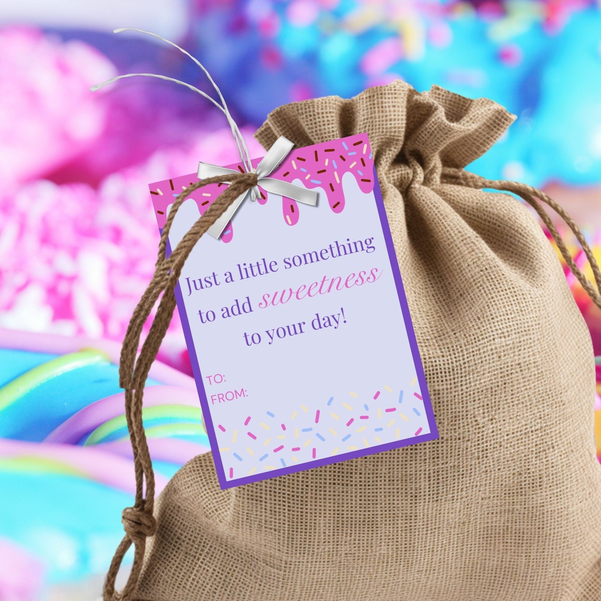 Colorful Mothers Day gift tags dripping with pink icing over a purple background, sprinkled with festive confetti. Text says Just a little something to add sweetness to your day! Love you, Mom! Happy Mother&#39;s Day!