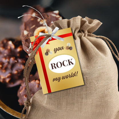 Elegant gold You ROCK my world! gift tags with red ribbon graphic, ready for a special touch with editable name feature.