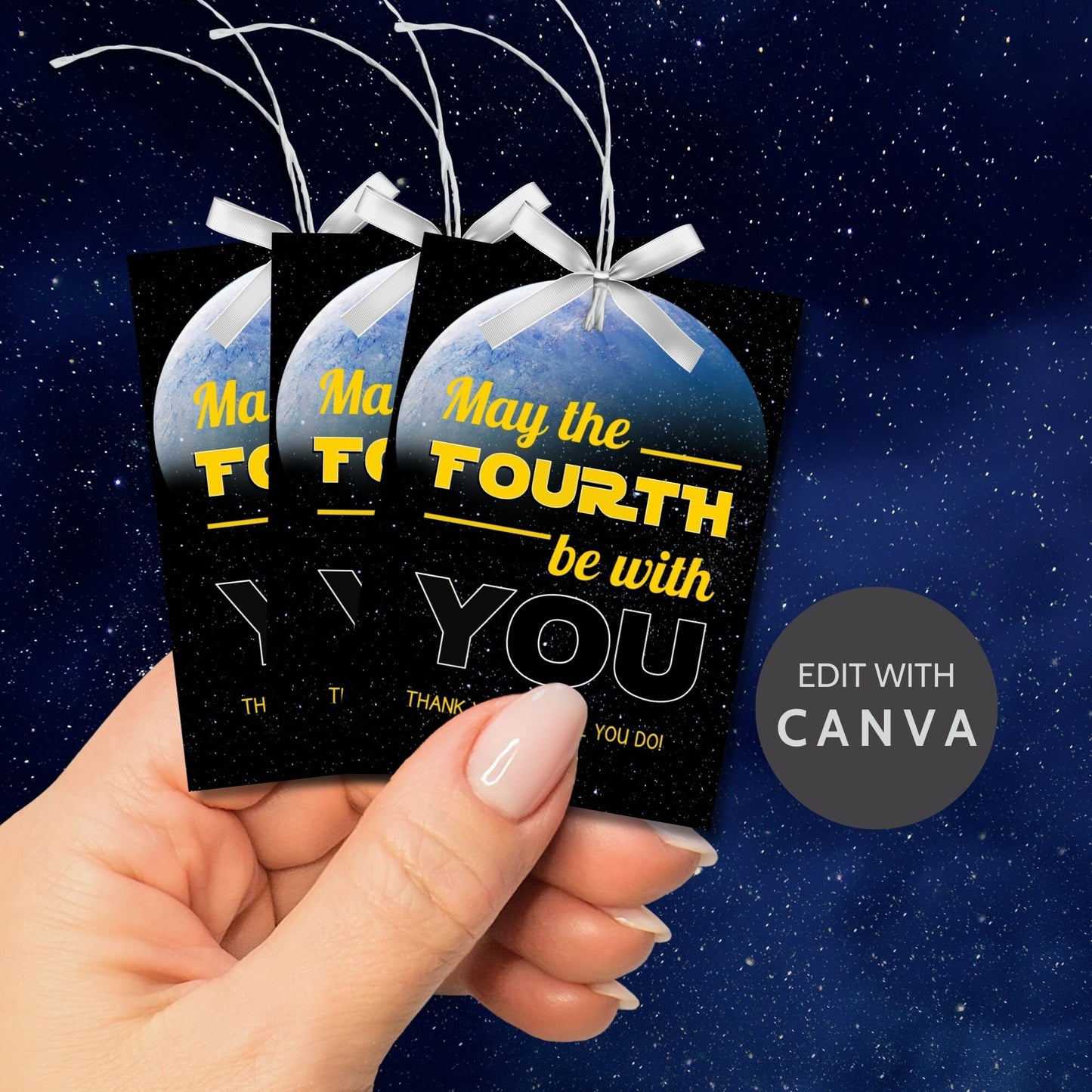 Starry space background with a vibrant Earth-like planet, featuring May the FOURTH be with YOU text for printing customizable gift tags.