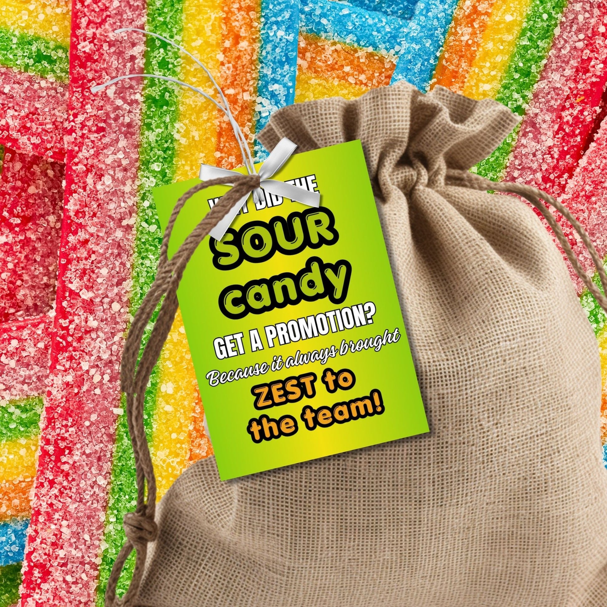 Why Did the Sour Candy Get a Promotion? Fathers Day gift tags with a bright green design. Features a joke about sour candy bringing zest to the team, with a customizable name field. Available as a printable PDF and an editable Canva template.