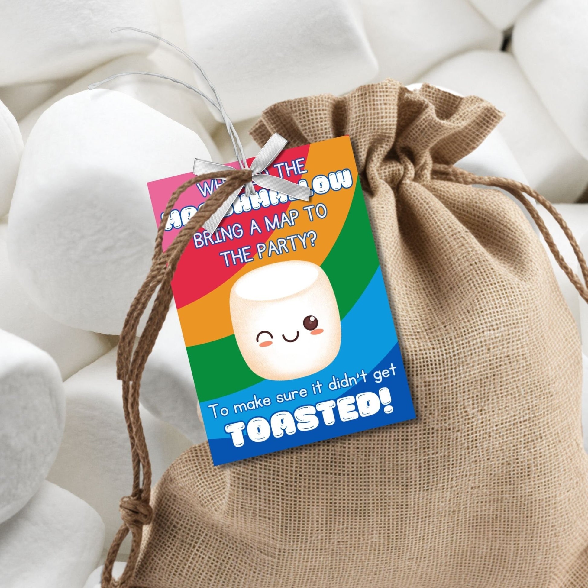 Eight marshmallow-themed Fathers Day gift tags displayed in two rows of four. Each tag features a dad joke about a marshmallow bringing a map to the party to avoid getting toasted, with a customizable name slot.