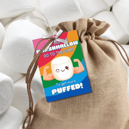 Eight gym-themed marshmallow Fathers Day gift tags displayed in two rows of four. Each tag features a dad joke about a marshmallow going to the gym to get more puffed, with a customizable name slot.