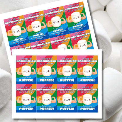 Eight gym-themed marshmallow Fathers Day gift tags displayed in two rows of four. Each tag features a dad joke about a marshmallow going to the gym to get more puffed, with a customizable name slot.