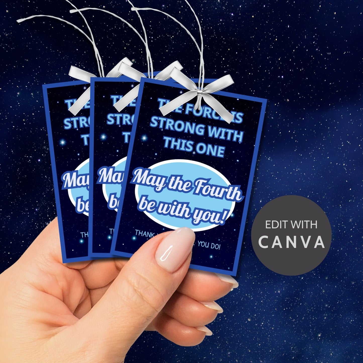 Star Wars-themed May the Fourth be with you gift tags featuring a cosmic background with stars and the text The Force is strong with this one. Perfect for Star Wars fans.