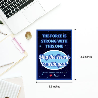 Star Wars-themed May the Fourth be with you gift tags featuring a cosmic background with stars and the text The Force is strong with this one. Perfect for Star Wars fans.