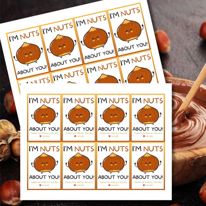 Im Nuts About You! appreciation gift tags featuring a cute cartoon hazelnut with arms, eyes, and a smile, bordered by an orange frame on a white background, ready for personalization.