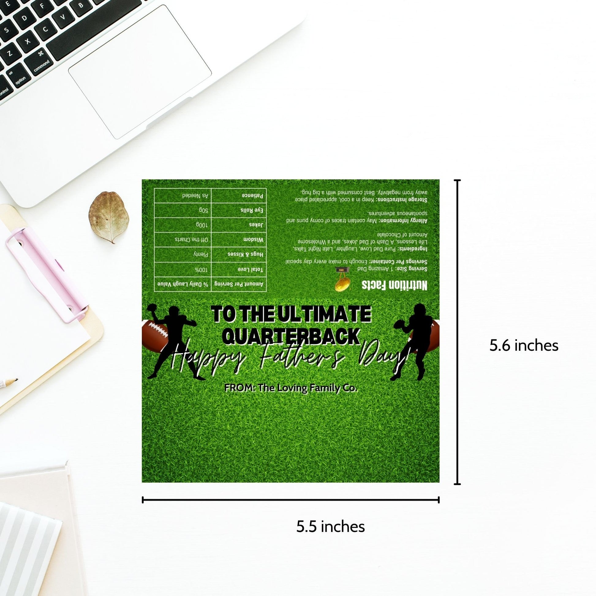 Football-themed Fathers Day chocolate bar wrapper featuring quarterback silhouettes on a grassy field background with the text To the Ultimate Quarterback! Happy Fathers Day! from the Loving Family Co.