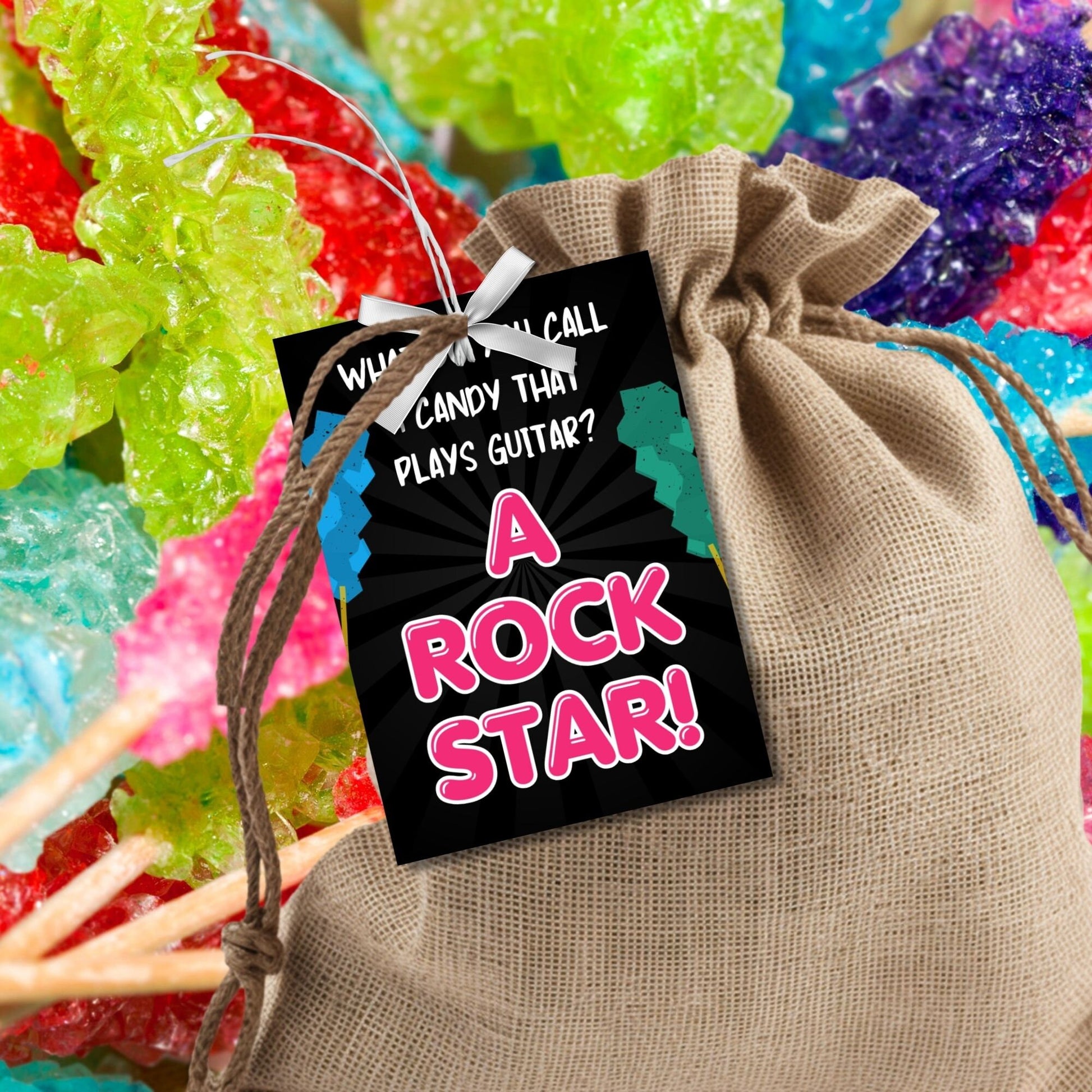 Eight guitar candy-themed Fathers Day gift tags displayed in two rows of four. Each tag features a dad joke about a candy that plays guitar being a rock star, with a customizable name slot.