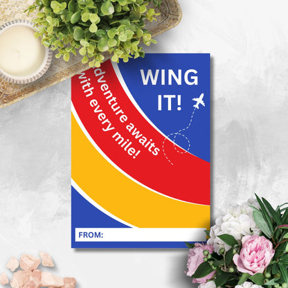 Colorful travel-themed card with Wing It! Adventure awaits with every mile! message and an airplane graphic, ideal for pairing with a Southwest Airlines gift card.