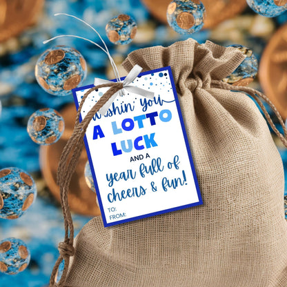 Eight lotto or scratchers-themed Fathers Day gift tags displayed in two rows of four. Each tag features a message about wishing dad a lotto luck and a year full of cheers and fun, with a customizable name slo.